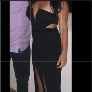 Black strapless jumpsuit with open front slits